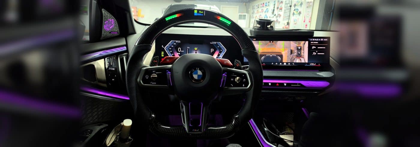 BMW X3 carbon fiber LED steering wheel with purple ambient interior lighting